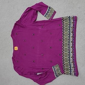 Woman's fushia beaded top